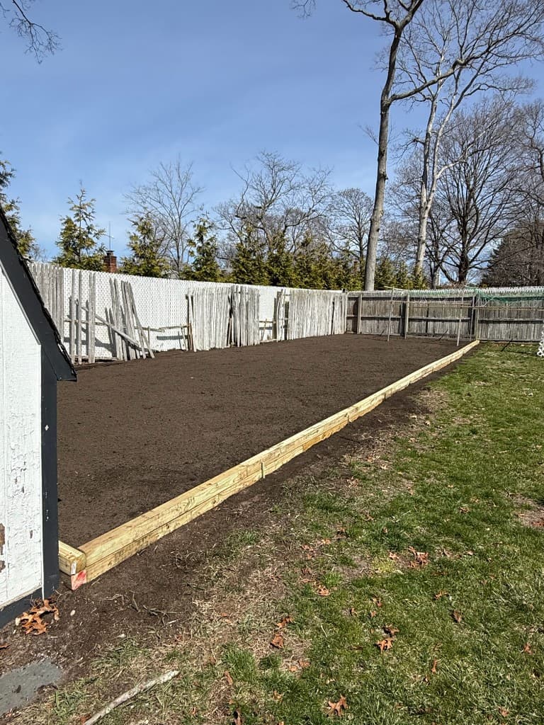 Large custom vegetable garden raised bed with fresh soil