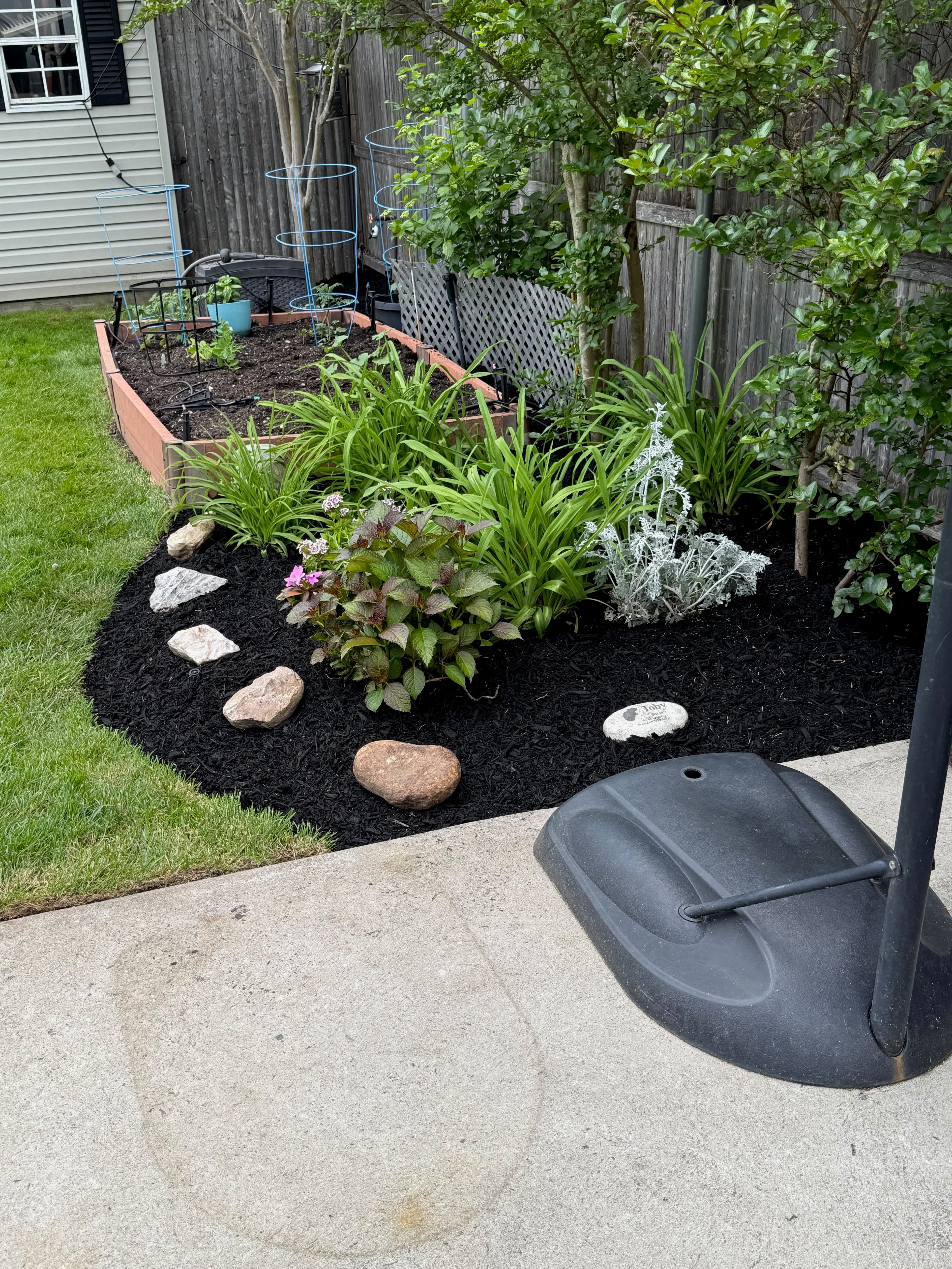 Beautiful mulch garden bed installation